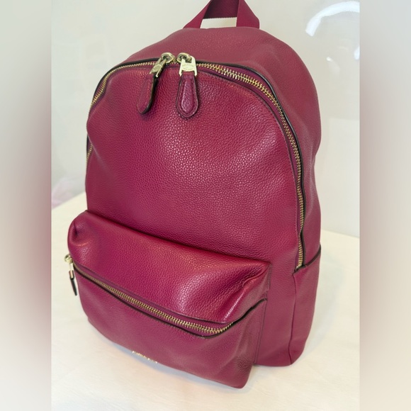 Like New: Coach Pebbled Leather Backpack in Berry - Picture 2 of 6